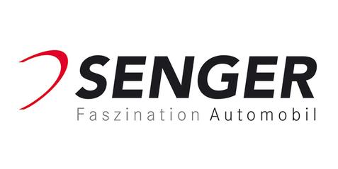 Logo von Senger mit Schriftzug „Faszination Automobil“ in Schwarz und Rot auf weißem Hintergrund.