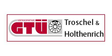 Logo der GTÜ Troschel & Holthenrich mit Schriftzug „Vertragspartner“ und abgebildetem Prüfgerät.